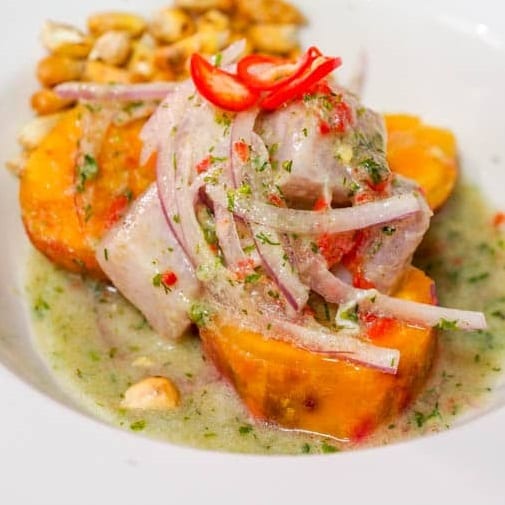 Peruvian ceviche on top of sweet potatoes